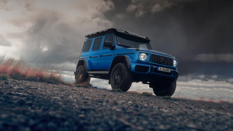 A mesmerizing 4K wallpaper featuring the luxurious Mercedes AMG G63 in a striking shade of blue. This high-resolution image showcases the perfect blend of elegance and power, making it an ideal choice for automotive enthusiasts.