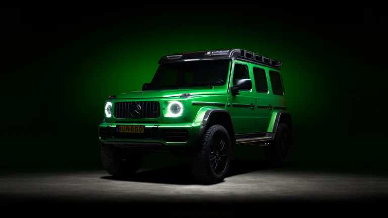 A stunning 4K wallpaper featuring the powerful Mercedes AMG G63 in an eye-catching green hue. The high-resolution image showcases the luxury off-road vehicle, highlighting its stylish design and commanding presence.