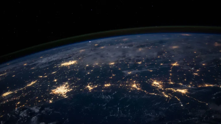 An awe-inspiring 4K PC wallpaper presents a breathtaking view of Earth from outer space, courtesy of NASA.