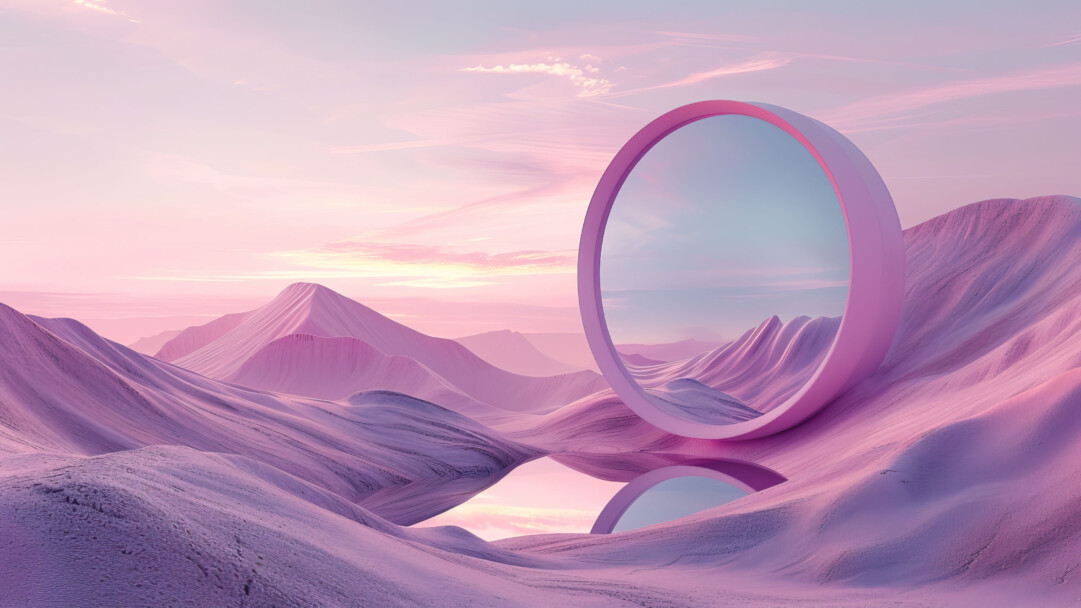 A mesmerizing 4K wallpaper presents a serene desert landscape painted in hues of pink, with the sky reflecting its colors onto the tranquil waters below. The sandy dunes stretch into the horizon, while the setting sun adds a warm glow to the scene, making it a perfect choice to adorn your desktop or mobile screen.