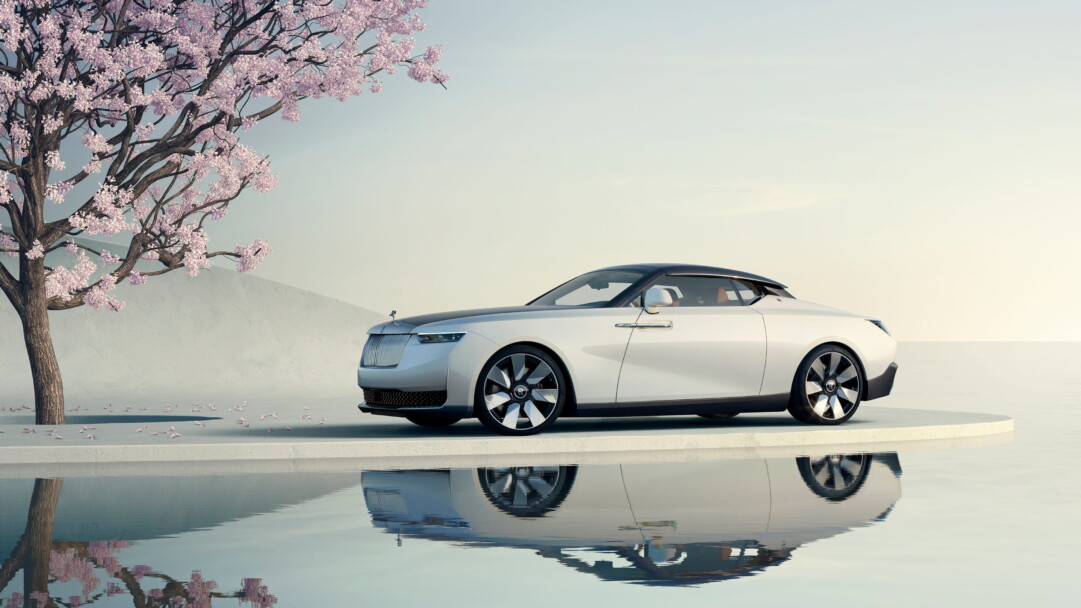 A sophisticated 4K wallpaper featuring the Rolls-Royce Arcadia Droptail, an epitome of automotive luxury. The high-resolution image captures the sleek design and elegance of this opulent vehicle, making it a perfect choice for adorning your desktop or mobile screen with automotive finesse.