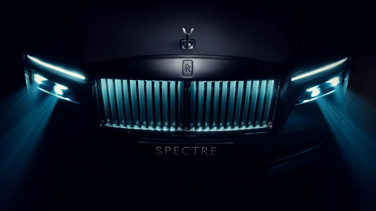 A luxurious 4K wallpaper featuring the Rolls-Royce Spectre, an epitome of automotive elegance. The high-resolution image showcases the sleek design and opulence of this luxury car, making it an ideal choice for your desktop or mobile background.