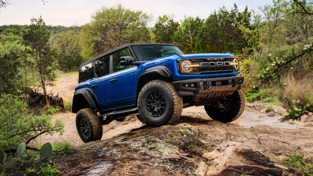 A captivating 4K wallpaper featuring the Ford Bronco Raptor, an iconic off-road SUV, navigating rugged terrain with ease.