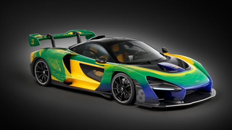 A stunning 4K wallpaper featuring the McLaren Senna, a high-performance sports car, set against a dynamic background. The sleek design and powerful presence of this luxury car are captured in high resolution, perfect for your desktop or mobile wallpaper.