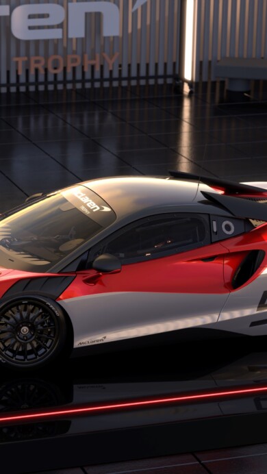 A stunning 4K wallpaper featuring the McLaren Artura Trophy Evo in dynamic motion. The high-resolution image showcases the sleek design and vibrant colors of the supercar, perfect for automotive enthusiasts and racing fans.