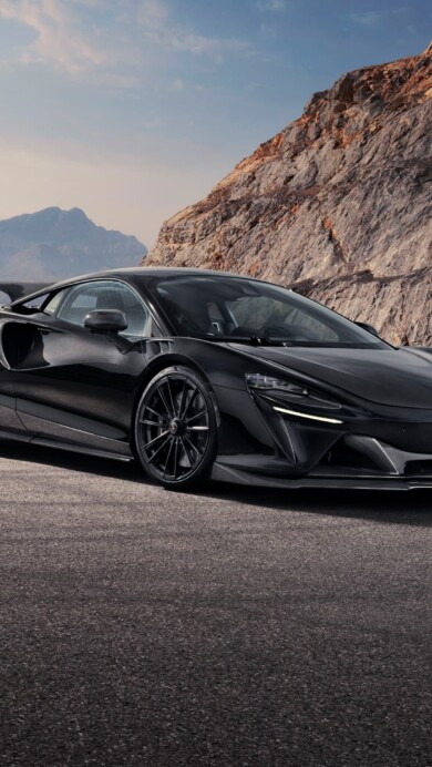 A stunning 4K wallpaper featuring the 2024 Novitec McLaren Artura. The high-resolution image showcases the sleek design and powerful presence of the car, making it perfect for automotive enthusiasts and desktop backgrounds.