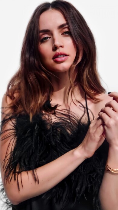 A beautiful 4K wallpaper featuring Ana de Armas against a clean white background. This high-resolution image highlights her natural beauty and elegance, making it perfect for desktop and mobile screens.