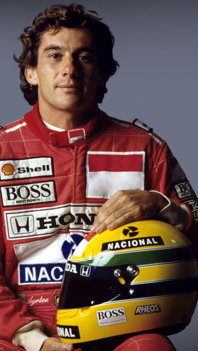 A captivating 4K wallpaper featuring legendary race driver Ayrton Senna in action. The high-resolution image highlights his iconic Formula 1 career, perfect for motorsport enthusiasts and as a dynamic desktop or mobile background.