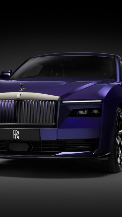A high-resolution 4K wallpaper featuring the Rolls-Royce Black Badge Spectre 2025, a luxurious all-electric coupe with a sleek black exterior, illuminated grille, and elegant design, set against a dramatic background.