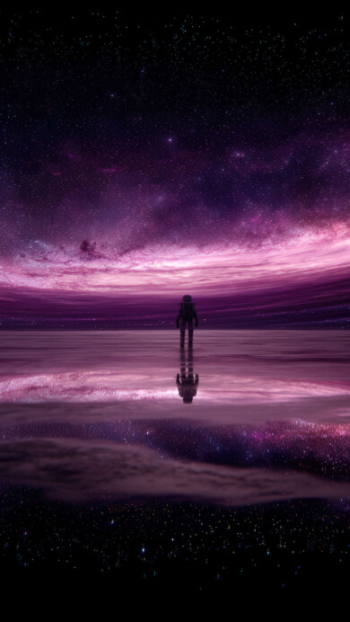 A breathtaking 4K wallpaper featuring a lone astronaut standing on the glassy surface of a cosmic ocean. A magnificent purple galaxy and swirling nebula dominate the sky, their brilliant light and countless stars creating a stunning reflection on the water below in this surreal celestial landscape.