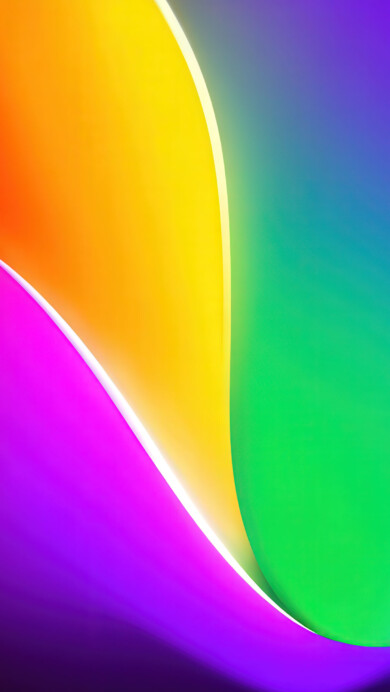 A vibrant abstract wallpaper featuring smooth, flowing waves of luminous color. A brilliant rainbow gradient sweeps across the image, with bold red, yellow, green, and purple hues blending seamlessly in a colorful, energetic flow.