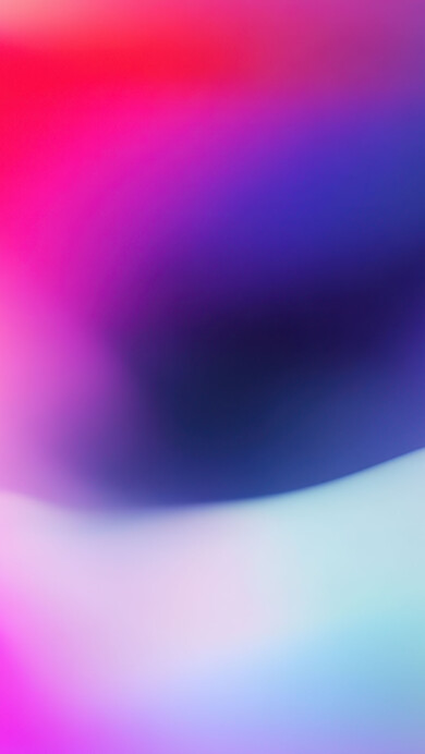 An ethereal 4K wallpaper of fluid, colorful gradients that blend seamlessly across the frame, suggesting a soft, undulating abstract landscape. Its smooth, luminous transitions between deep purples, vivid fuchsias, and gentle aquas create a mesmerizing, dreamlike atmosphere.