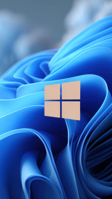 A striking 4K wallpaper showcases a vibrant, flowing azure blue ribbon-like form, subtly embedded with a glowing Windows logo, set amidst a softly blurred background of frosted, crystalline structures. The smooth, illuminated curves of the central element beautifully contrast with the delicate, textured details of the icy flora, creating a serene and modern visual experience.