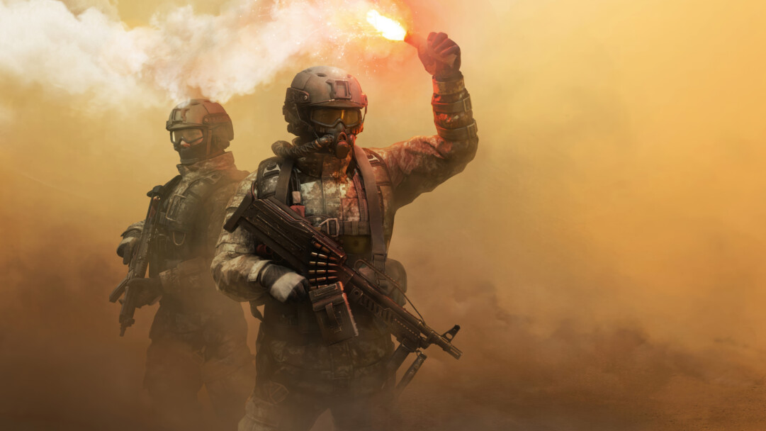 A tactical 4K wallpaper showcasing two combat-ready soldiers amidst a dense, smoke-filled environment. The lead operative, armed with a heavy machine gun, illuminates the scene by dramatically raising a brilliant red signal flare, casting an urgent, fiery glow across the hazy battleground.