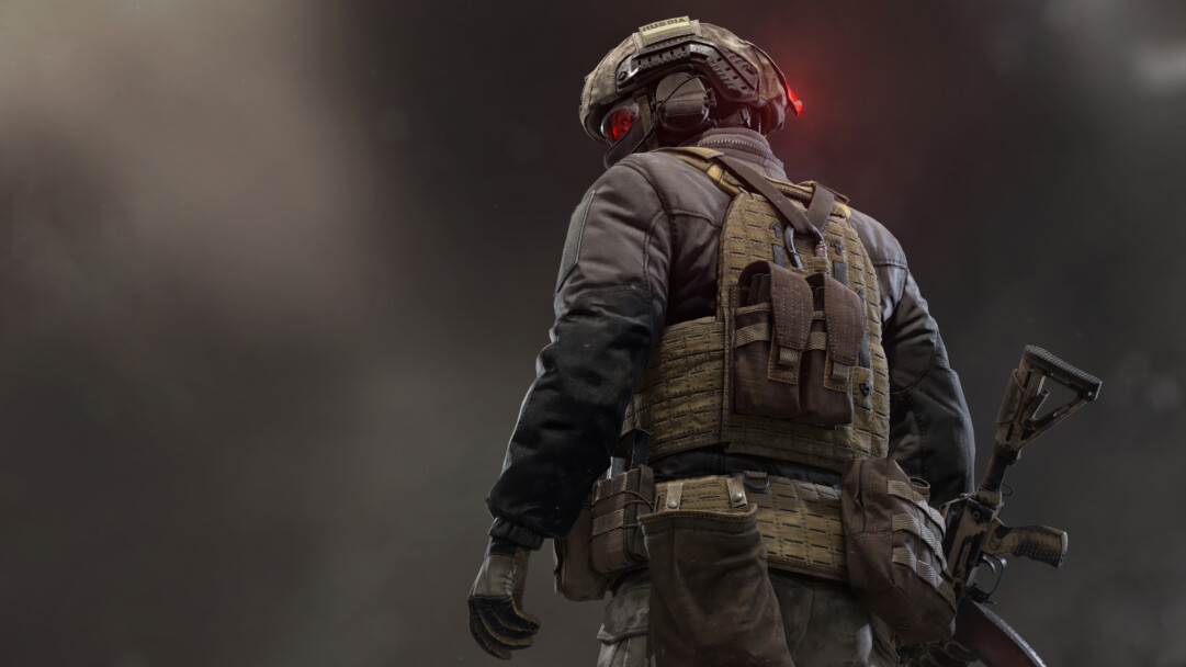 A formidable 4K wallpaper featuring a heavily armored Caliber game soldier, seen from behind, standing vigilantly against a smoky, desolate backdrop. The intricate details of the soldier's tactical equipment and the ominous red glow from their helmet create a serious, intense mood.