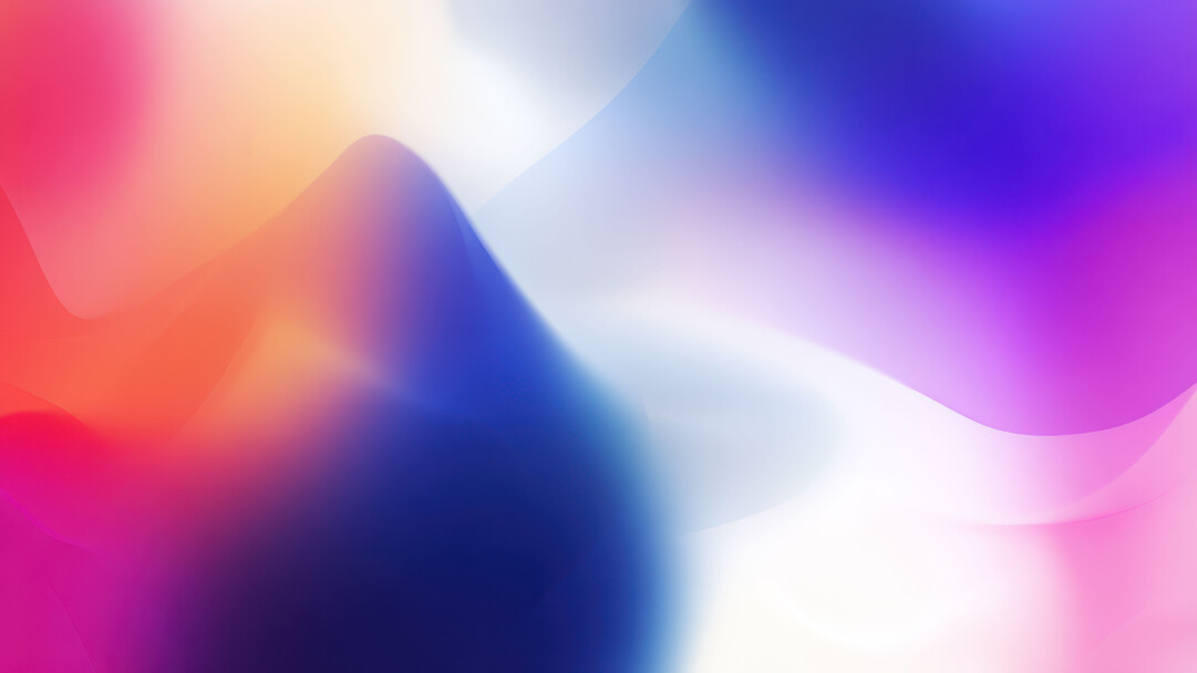 A mesmerizing 4K wallpaper showcases an abstract composition of colorful, soft gradient flows, creating a dynamic wallpaper experience. Smooth transitions between vibrant fuchsia, orange, blue, and purple hues blend into luminous white expanses, evoking a serene and fluid mood.