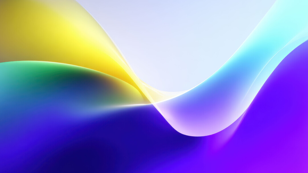 A mesmerizing 4K wallpaper showcases dynamic, undulating waves of vibrant color that gracefully sweep across a soft, gradient background, reminiscent of the modern aesthetic of Windows 11. The smooth transitions from bright yellow and green to deep blues and purples, highlighted by luminous, translucent edges, create a captivating sense of depth and fluidity.