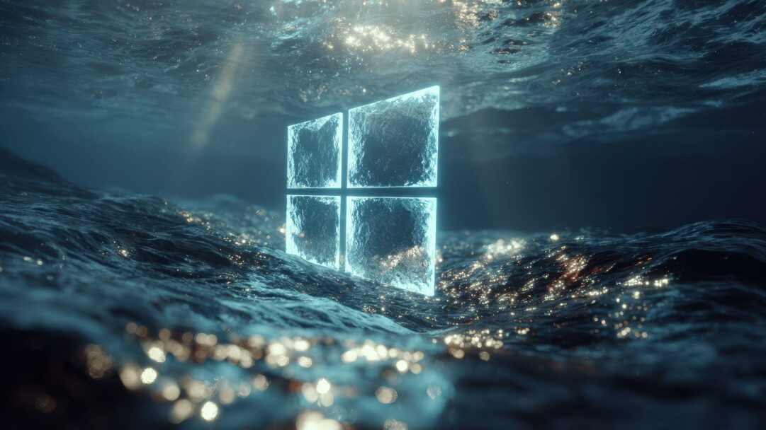 An otherworldly 4K wallpaper of a glowing, textured 3D Windows logo seemingly suspended in dark, rippling water. Its ethereal blue glow illuminates the surrounding depths, while brilliant golden light dances across the water's surface and scatters as bokeh below, creating an immersive, mysterious ambiance.