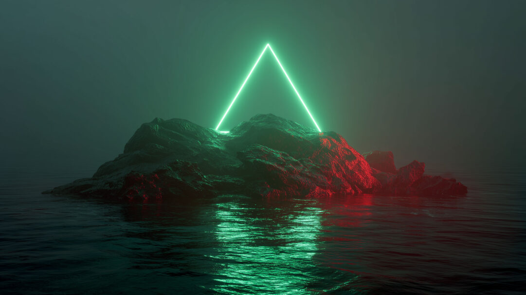 A mystical 4K wallpaper depicts a rugged island rising from dark, still water, intensely lit by a brilliant neon green triangle at its peak. The vibrant green light reflects dramatically on the water, while a subtle red glow illuminates the island's opposite side, creating an enigmatic and immersive mood.