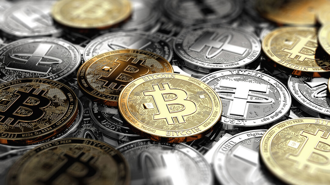 A gleaming 4K wallpaper showcasing a diverse pile of Bitcoin and various altcoin tokens, representing the dynamic crypto economy. The golden Bitcoin coins prominently shine in the foreground with intricate circuit patterns, sharply contrasted against the blurred, silvery altcoins in the background, conveying a sense of digital prosperity.