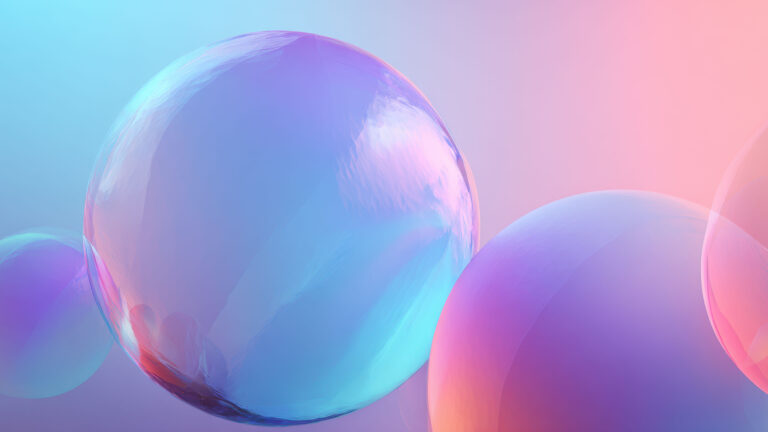 A shimmering 4K wallpaper showcases several iridescent translucent abstract spheres floating against a soft gradient background. The captivating digital art reveals a beautiful interplay of blues, purples, and pinks, creating a smooth, dreamlike aesthetic with subtle textural shifts on the sphere surfaces.