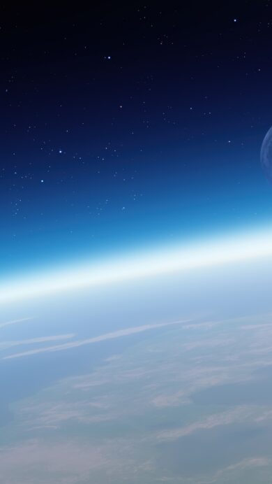 A breathtaking 4K wallpaper unveils the majestic Moon positioned above Earth's illuminated atmospheric curve, a signature view evoking the awe of the OS X Mountain Lion cosmos. Deep indigo space, speckled with countless stars, contrasts dramatically with the serene blue and white gradient of Earth's atmosphere, highlighting the Moon's crisp, textured surface.