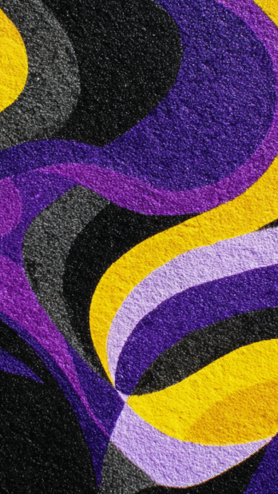 A vibrant 4K wallpaper showcases an abstract design of smoothly undulating, organic waves covering the entire frame. The pattern features intertwining broad bands of vivid purple, golden yellow, dark black, and various shades of gray, all rendered with a tactile, slightly grainy texture that enhances its dynamic flow.