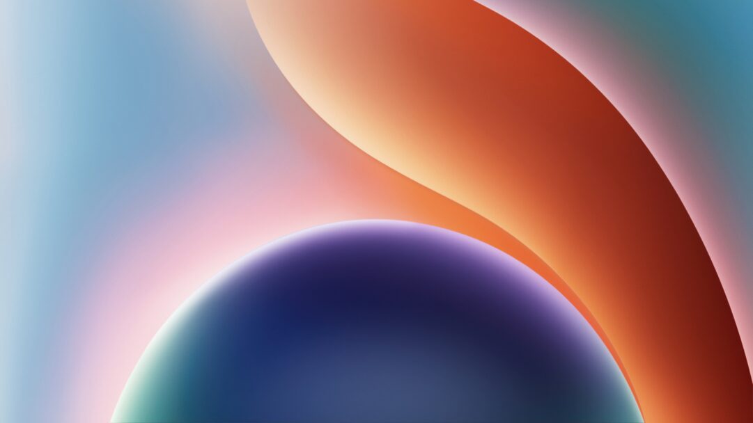 A captivating 4K wallpaper features fluid abstract waves, gracefully transitioning through a vibrant gradient of blue, orange, and purple hues. The interplay of soft light and seamless color shifts creates a dynamic yet serene visual flow, evoking a sense of calm and modern elegance.