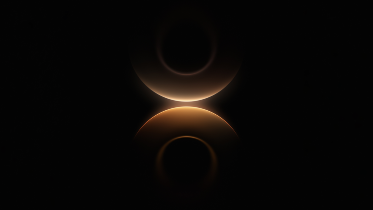 A mesmerizing 4K wallpaper featuring abstract orange gold arcs against a deep black background. The two luminous arcs subtly reflect each other, glowing intensely where they almost meet at the center, creating a soft, ethereal light transition that evokes a sense of cosmic serenity.