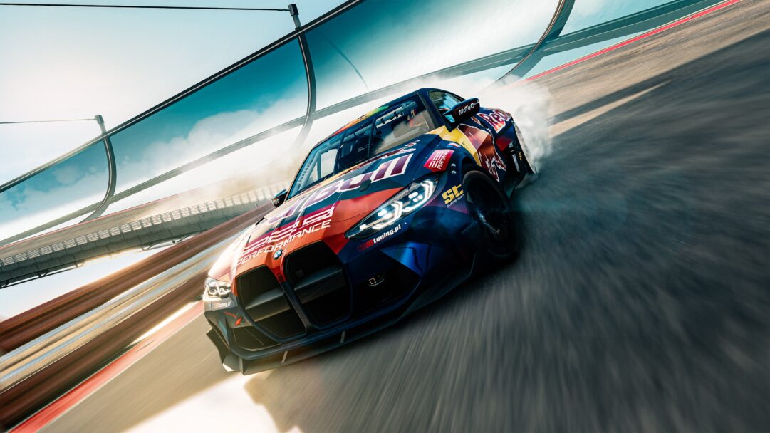 A thrilling 4K wallpaper captures a BMW M4 Red Bull Race Car fiercely drifting on a dynamic track under a bright sky. Its vibrant red and blue livery contrasts sharply with the white tire smoke billowing from its rear wheels, conveying intense speed and precision on the sunlit circuit.