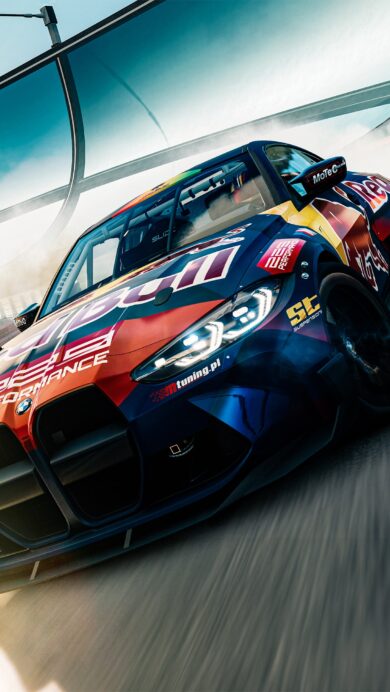 A thrilling 4K wallpaper captures a BMW M4 Red Bull Race Car fiercely drifting on a dynamic track under a bright sky. Its vibrant red and blue livery contrasts sharply with the white tire smoke billowing from its rear wheels, conveying intense speed and precision on the sunlit circuit.