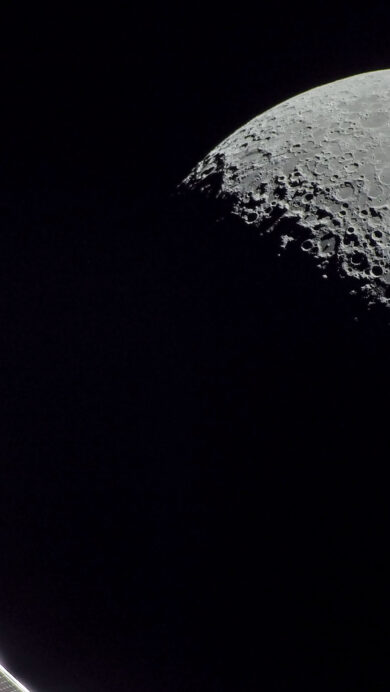 A magnificent 4K wallpaper captures the NASA Orion spacecraft during its Artemis Mission, featuring its gleaming white components and a deployed solar array against the black expanse of space. The starkly illuminated, heavily cratered crescent Moon dominates the right side, creating a breathtaking juxtaposition that underscores the profound ambition of lunar exploration.