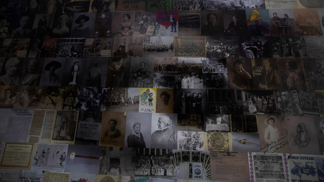 A profound 4K wallpaper presents a rich, multi-layered archival collage documenting the Women's Suffrage Movement. Its dense arrangement showcases countless black and white portraits, historic protest scenes, and period documents, woven together to evoke the determined spirit and broad scope of the fight for women's voting rights.